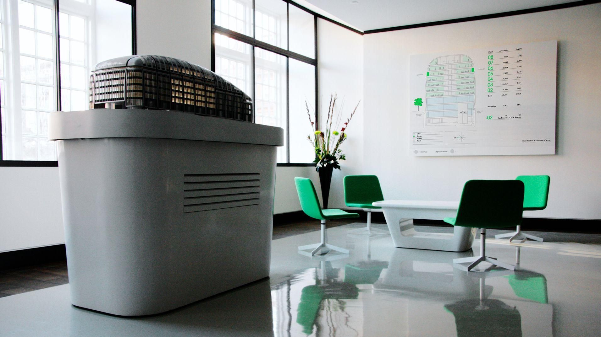 The cylindrical Park House architectural model within the development's marketing suite.