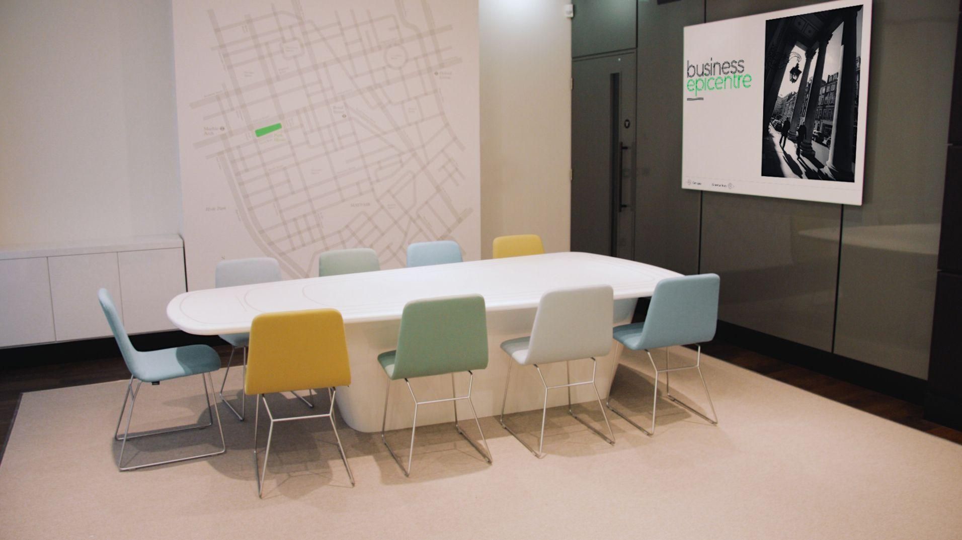 The Park House meeting room with presentation screens and architectural graphics.