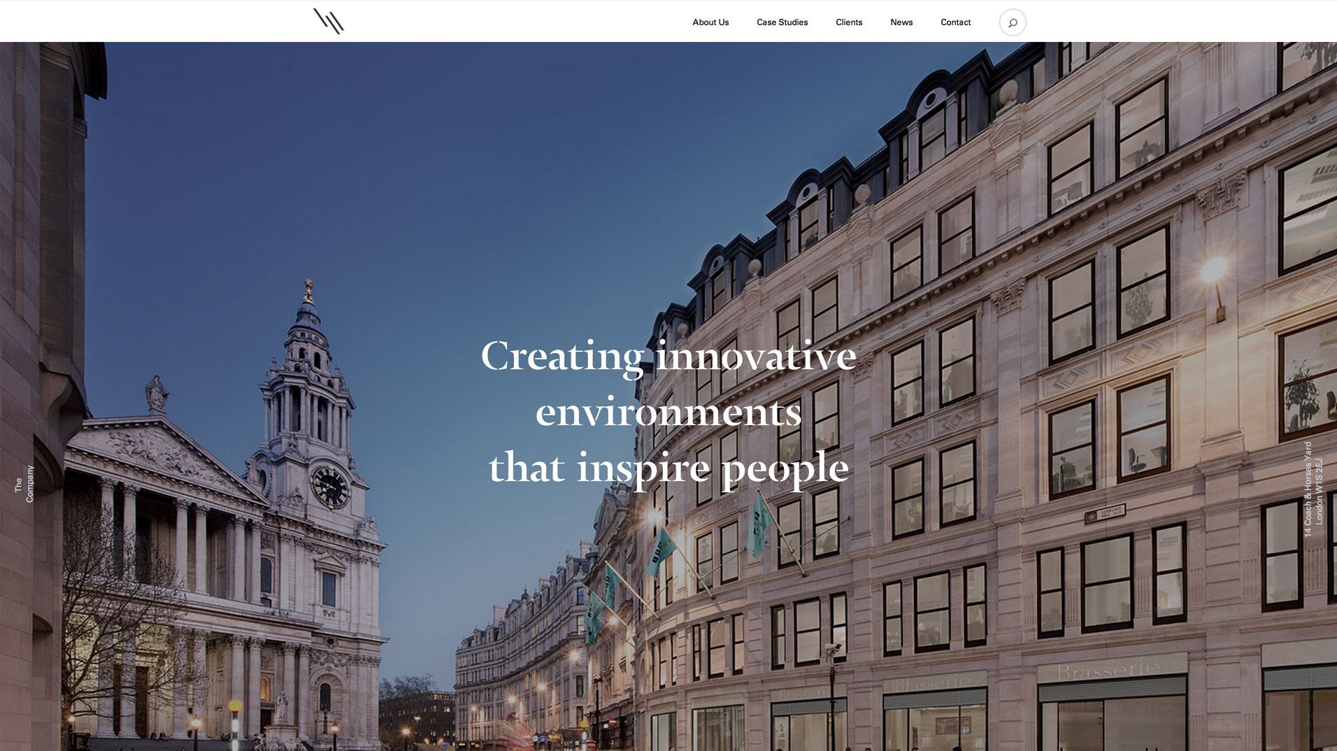 The website home page with a full-width photograph of a London streetscape.