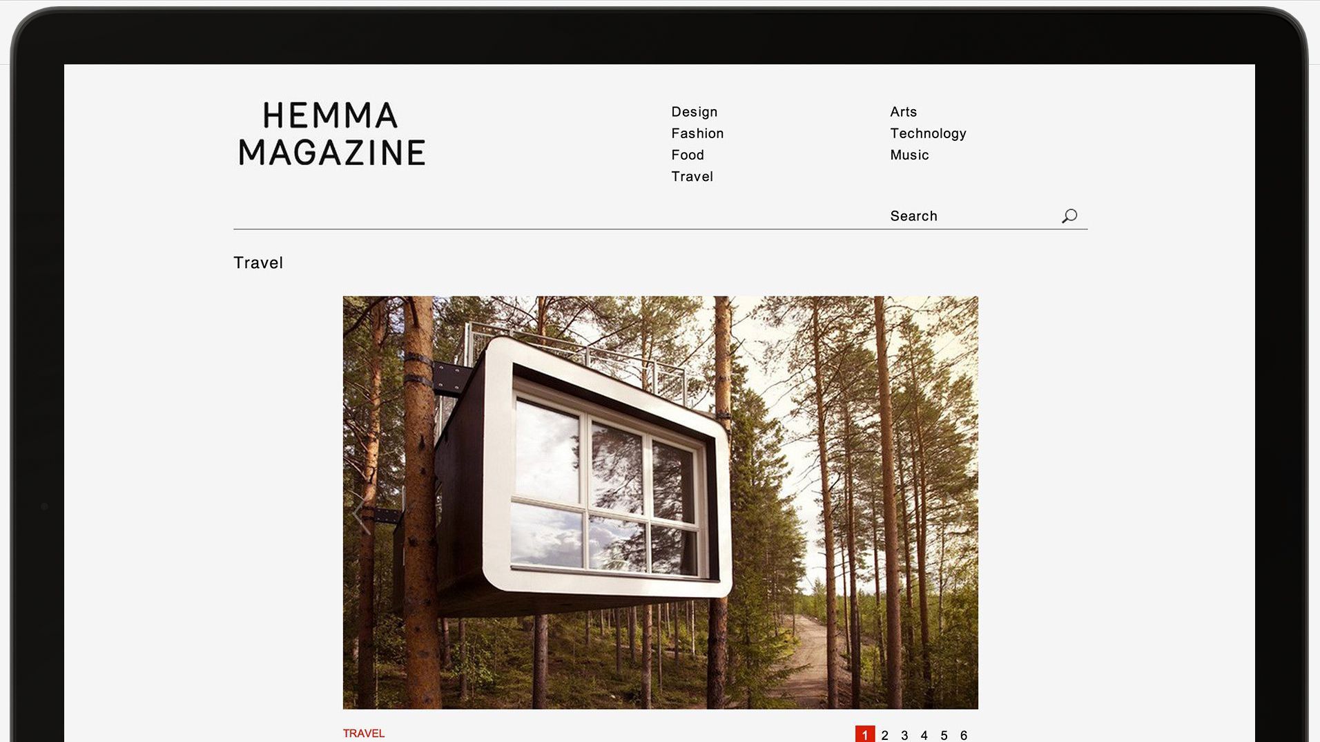 A Hemma travel page led by a photograph of a television installed in woodland.
